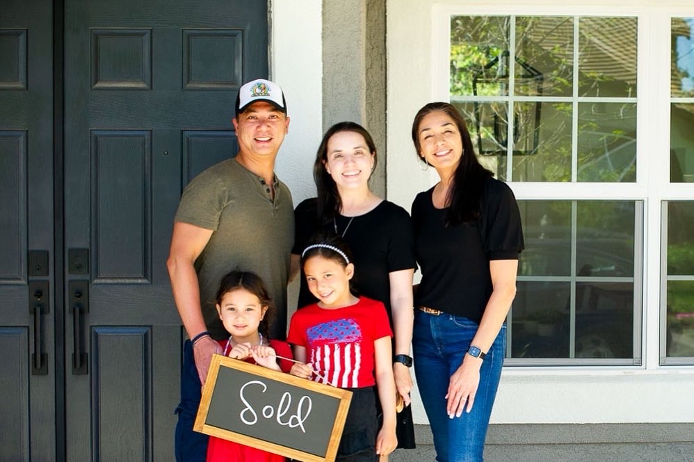 Family with real estate agent