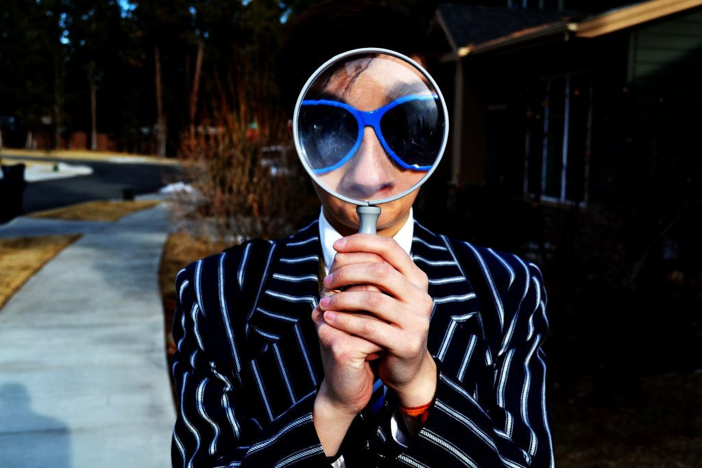 woman with magnifying glass