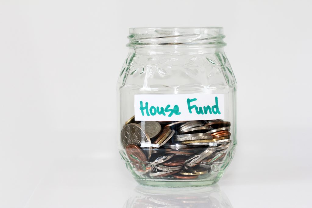 house fund jar with change